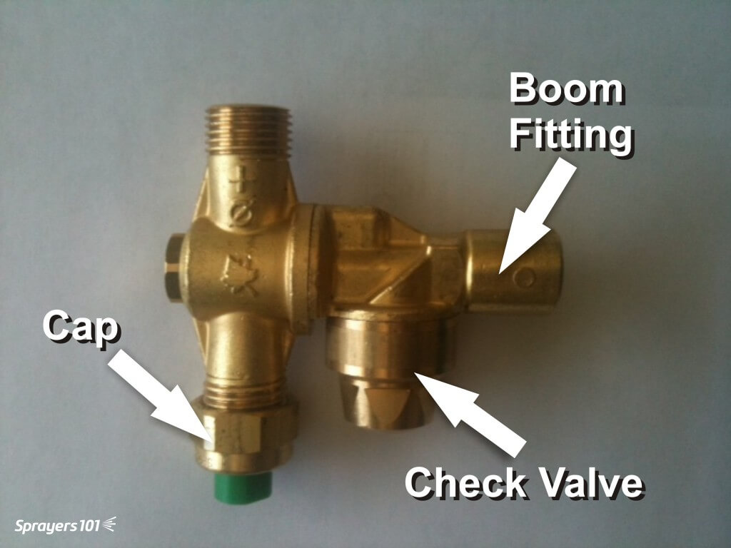 A typical brass roll-over style dual nozzle body with Cap and optional check valve.